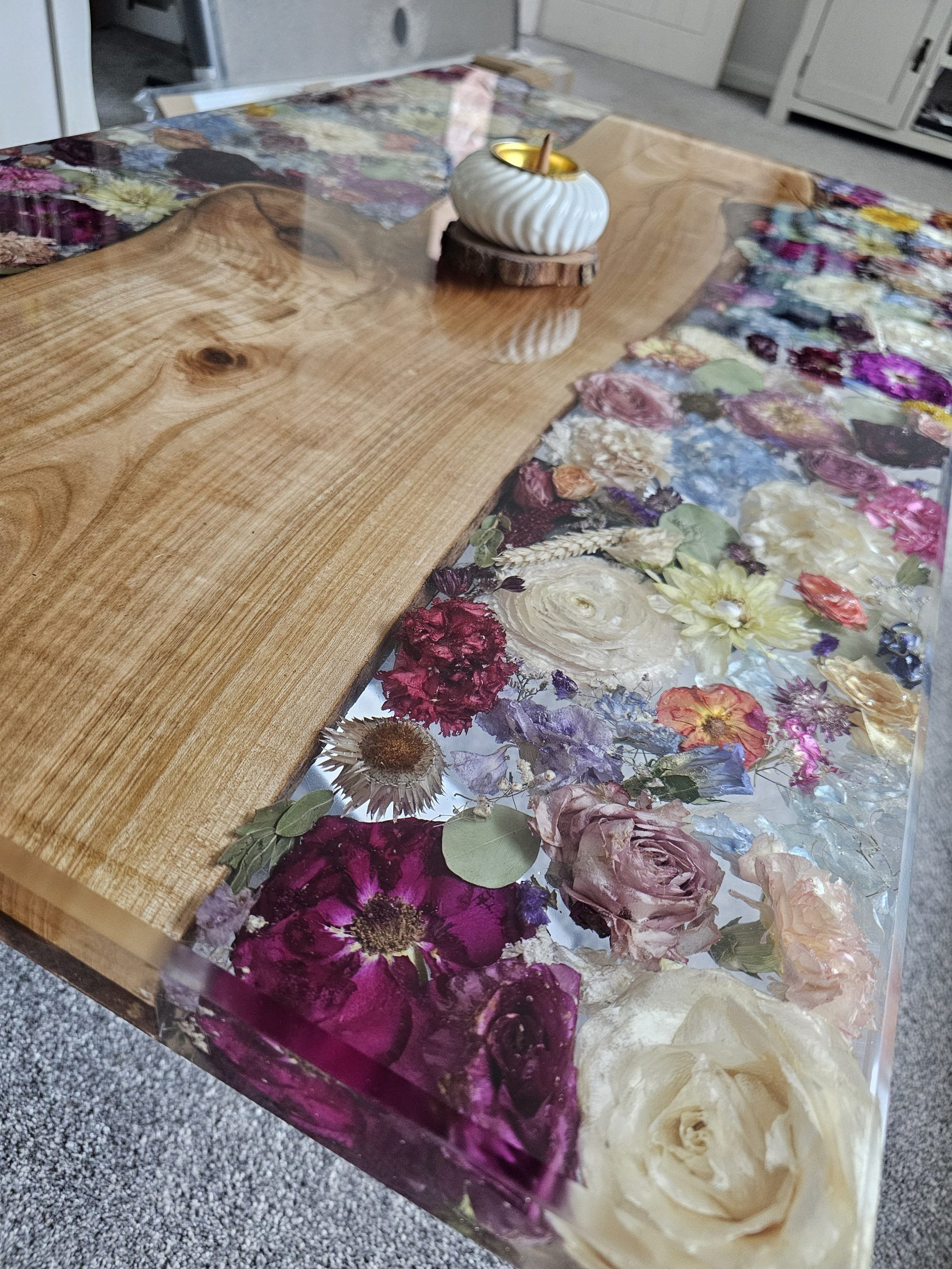 Luxury resin and wood coffee table featuring preserved wedding flowers, created through expert flower preservation in the UK.