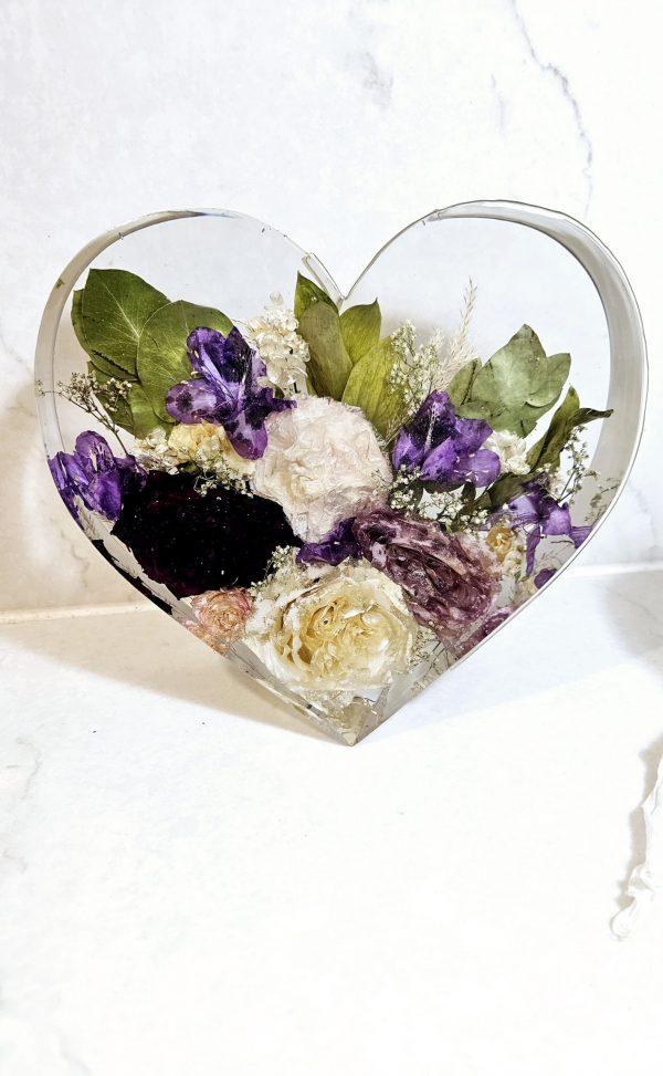 wedding flowers preserved in a large crystal clear resin standing heart ornament keepsake