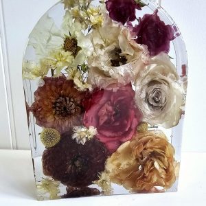 wedding flowers preserved in a crystal clear resin arch