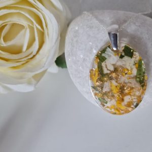 resin flower preservation round or oval pendant set on sterling silver jewellery setting