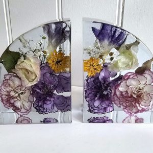 crystal clear resin wedding bouquet book ends. full of purple white and pink wedding flowers