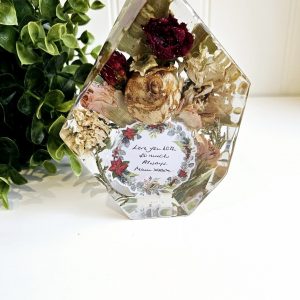 gem shape clear resin ornament with funeral flowers preserved within it