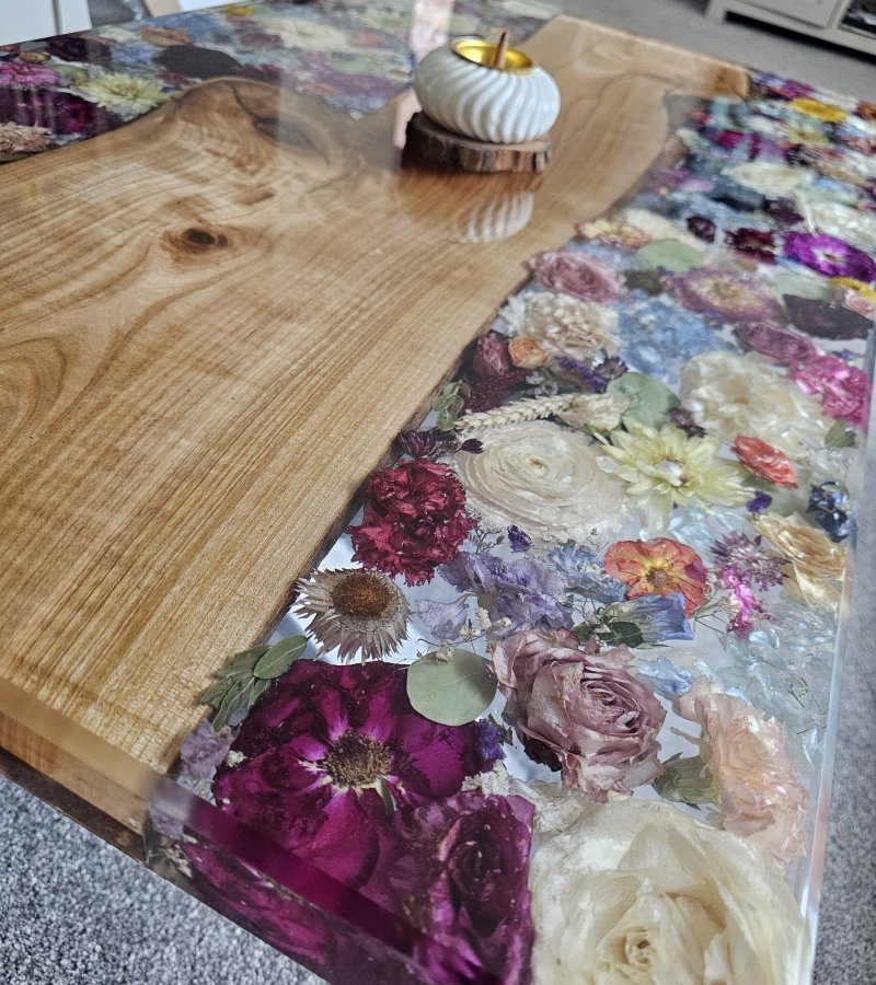 Luxury resin and wood coffee table featuring preserved wedding flowers, created through expert flower preservation in the UK.